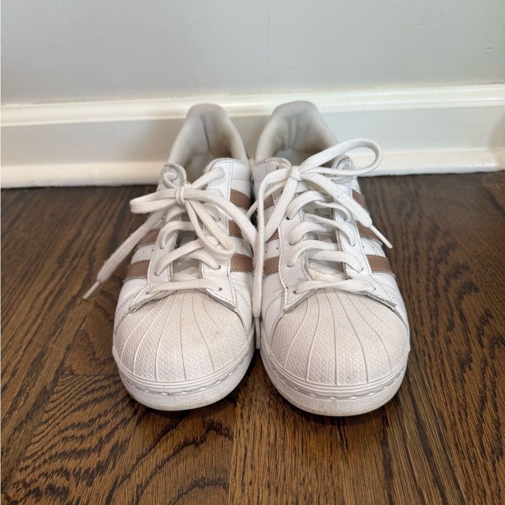Adidas Superstar sneakers in White and Rose Gold